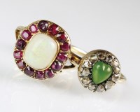 Lot 232 - An opal and garnet cluster ring, together with...