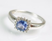 Lot 235 - An 18ct white gold tanzanite and diamond...