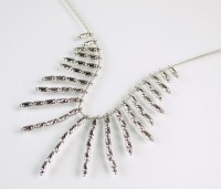 Lot 239 - A 9ct white gold graduated fringe necklace,...