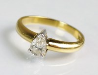 Lot 243 - An 18ct gold single stone pear cut diamond...