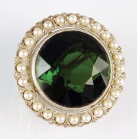 Lot 265 - An early 20th century green tourmaline, pearl...