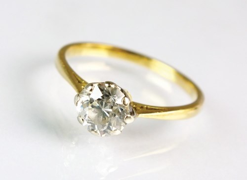Lot 270 - An 18ct gold single stone diamond ring, the...
