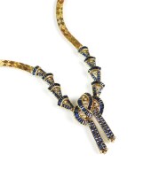 Lot 276 - A sapphire and diamond stylised fan necklace,...