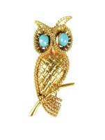 Lot 296 - A turquoise set owl brooch, designed as a...