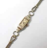 Lot 310 - A Lady's white metal diamond set cocktail...