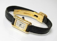 Lot 325 - A Lady's 18k Cartier tank quartz wristwatch,...