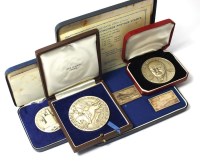 Lot 653 - A cased set of three silver replicas of the...