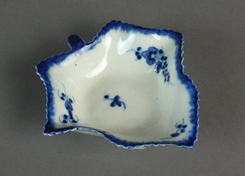 Lot 11 - A small Caughley pickle leaf dish painted with...
