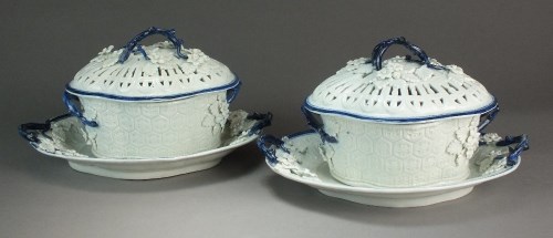 Lot 18 - A pair of Caughley chestnut baskets, covers...
