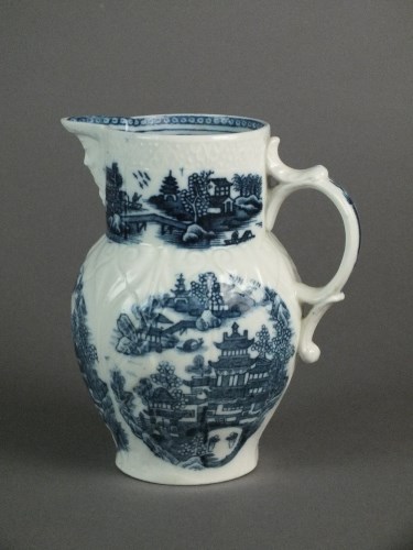 Lot 29 - A Caughley mask head jug transfer-printed with...