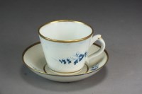 Lot 128 - A Caughley coffee cup and saucer painted with...