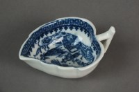 Lot 139 - A Caughley geranium leaf butter boat...