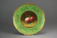 Lot 209 - A Coalport fruit-painted cabinet plate by...