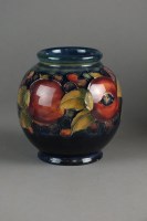 Lot 284 - A Moorcroft globe form vase in the Pomegranate...