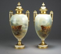 Lot 300 - A pair of Royal Worcester twin-handled vases...