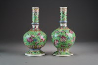 Lot 359 - A near pair of Chinese famille rose green...