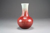 Lot 389 - A Chinese soft paste copper red glazed bottle...