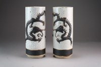 Lot 390 - A pair of Chinese Guan type sleeve vases, late...