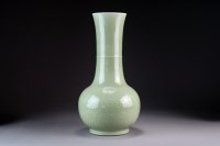 Lot 392 - A Chinese celadon glazed bottle vase, Jiajing...