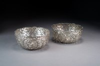 Lot 425 - A pair of Chinese pierced silver bowls, Luen...