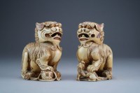 Lot 442 - A pair of Chinese ivory guardian lions, Qing...