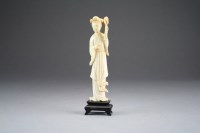 Lot 452 - A Chinese carved ivory figure of Guanyin, late...