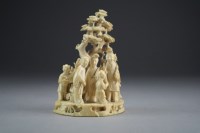 Lot 453 - A Chinese carved ivory figure group, Qing...