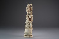 Lot 492 - A Japanese marine ivory okimono of immortals,...