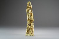 Lot 502 - A Japanese marine ivory okimono of a farmer...