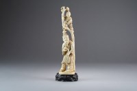 Lot 503 - A Japanese marine ivory okimono of a sennin...