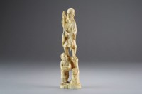 Lot 506 - A Japanese marine ivory okimono of a farmer...