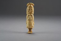 Lot 526 - A Japanese ivory netsuke, Edo period, carved...