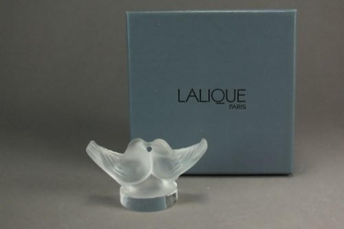 Lot 554 - A Lalique crystal model of two lovebirds,...