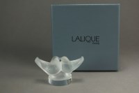 Lot 554 - A Lalique crystal model of two lovebirds,...