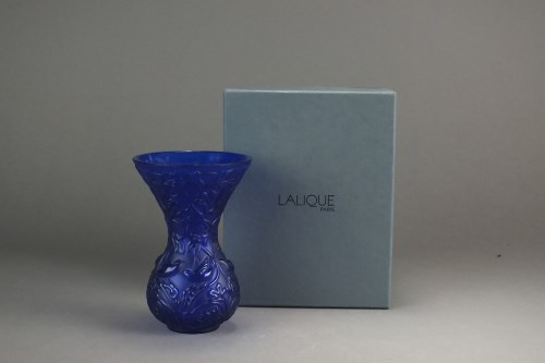 Lot 556 - A Lalique Crystal vase Arabesque bud vase, a...