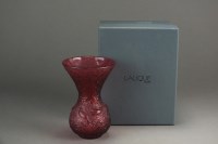 Lot 557 - A Lalique Crystal Arabesque vase in ruby, with...