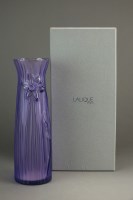 Lot 558 - A Lalique crystal Daffodil vase in violet,...