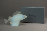 Lot 559 - A Lalique opalescent glass fish paperweight...