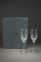 Lot 564 - A pair of Lalique crystal wine glasses...