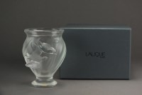 Lot 566 - A Lalique Crystal vase decorated in relief...