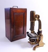 Lot 610 - A 19th century brass microscope by Salmon, 100...