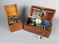 Lot 614 - A mahogany cased induction coil electric shock...