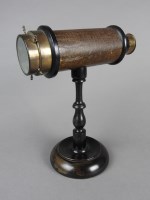 Lot 623 - A kaleidoscope on stand, late 19th/early 20th...