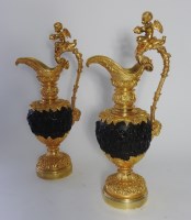 Lot 658 - A pair of gilt metal and bronze patinated...