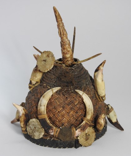 Lot 661 - An Iban warriors hat from Borneo, 18cm diameter