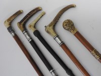 Lot 672 - Three various horn handled crop whips along...