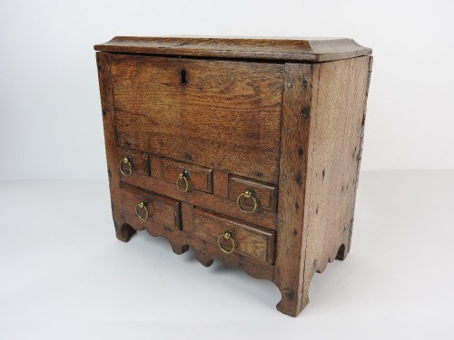 Lot 680 - A Welsh vernacular oak table cabinet, 18th...