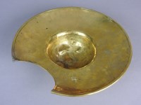 Lot 692 - A sheet brass barber's shaving bowl, circa...