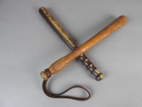 Lot 698 - Two Victorian police truncheons, one painted...