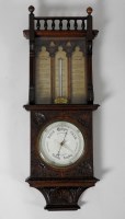 Lot 720 - A Victorian oak aneroid barometer, the 7.5...